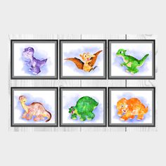 four framed pictures of different types of dinosaurs