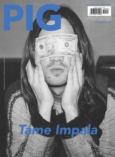 a man with long hair and glasses on top of his head is holding money in front of his eyes