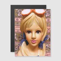 a painting of a blonde haired girl with sunglasses on her head and pink cheeks is shown