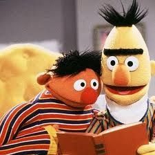 sesame and bert reading a book together