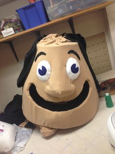 an inflatable head sitting on top of a table