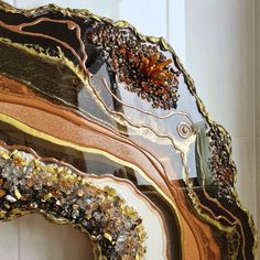 a large piece of art that looks like it is made out of glass and gold