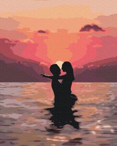 two people are kissing in the water at sunset