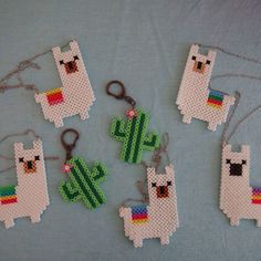 some llamas and cactuses are made out of perler beads