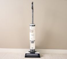 a vacuum that is sitting on the floor