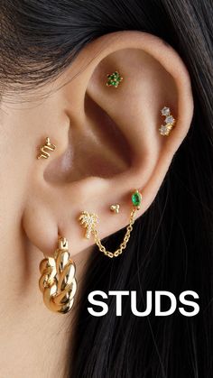 a woman with ear piercings on her ears and the words studs written below it