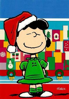 a charlie brown christmas card with a cartoon character wearing a santa hat and green dress