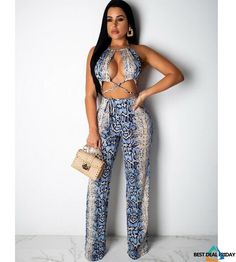 This is the perfect outfit for a night of fun! The crop top is sleeveless and features a hot snake print design. The pants are loose and flowy, and feature a lace up design.Material: PolyesterStyle: womens sleeveless bodycon Romper TrousersOccasion: Casual,Party,Club,BeachSize: S/M/L/XLThere is 2-3% difference according to manual measurement.please check the measurement chart carefully before you buy the item.1 inch = 2.54 cmPlease note that slight color difference should be acceptable due to... Crop Tops Lace, Bodycon Romper, Lace Crop Tops, Casual Party, Snake Print, Perfect Outfit, Print Design, Rompers, Lace Up