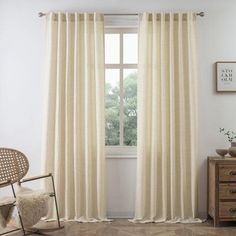 the curtains in this room are white and beige