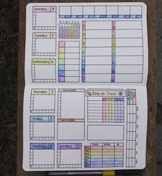 two planner pages on top of each other with different colored lines and numbers in them