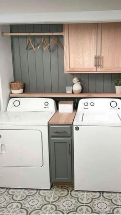 a washer and dryer in a small room