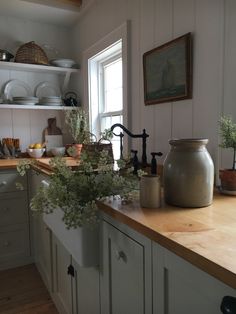 the kitchen counter is clean and ready to be used as a centerpiece for dishes