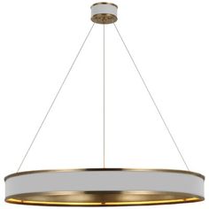 a large circular light fixture with an oval design on the bottom and gold trimmings