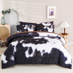 a black and white cow print comforter set