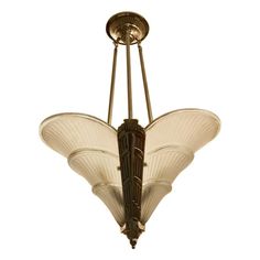 an art deco chandelier hanging from the ceiling