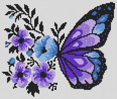 a cross stitch butterfly with purple and blue flowers on it's back side,