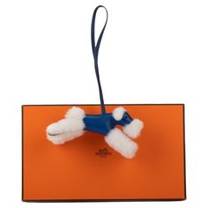 Hermès new in box electric blue milo leather and shearling dog charm. Date stamp U for 2022. Drop 9.5”. Dog Charms, Electric Blue, Stamp, Dogs, Blue, Leather