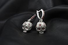 "Silver skull earrings \" Flover Frida\" Metal - Sterling Silver 925 Gemstones - cubic zirconia Weight - 10 grams. We need 2 weeks to make a earrings with various changes such as: -other size (Custom order only) -other jewelry stones -and so on Please check all my ring's catalog to choose your favorite https://www.etsy.com/shop/YetiBikersJewelry All of our items have been designed and produced by ourselves All your feedback is very important for us. Please don't forget to leave us a positive fee Mens Silver Pendants, Skull Earring, Biker Rings Mens, Biker Accessories, Skull Accessories, Jewelry Stones, Jewelry Gothic, Biker Jewelry, Red Gemstones