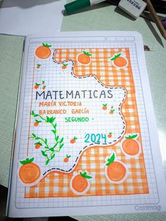 an orange and white checkered mat with the words matentaicas written on it