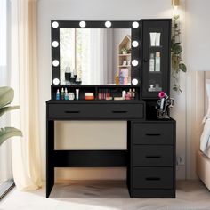 a black vanity with lights on it next to a bed