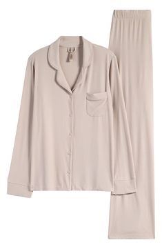 These essential PJs made from the brand's signature, stretchy modal rib bring relaxed comfort to your nighttime routine. 26" top length; 30" inseam; 22" leg opening; 11 1/2" front rise; 16" back rise (size Medium) Top has notched collar; long sleeves; chest patch pocket Pants have drawstring waist 91% modal, 9% spandex Machine wash, dry flat Imported Skims Pajamas, Hannukah Gift, Nighttime Routine, Night Time Routine, Sleep Set, Fabric Gift Bags, Pocket Pants, Notched Collar, Nordstrom Store