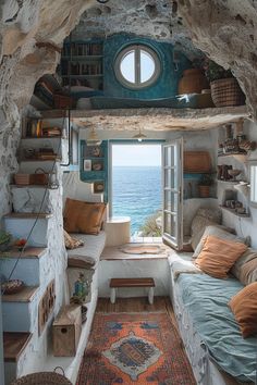 the interior of an old stone house with a window and stairs leading up to it