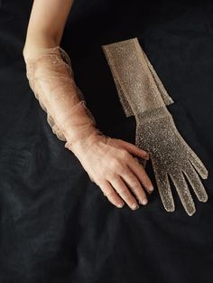 a Pair of Transparent Sparkly Gloves, Over Elbow Length, Fingerless or With Fingers: This item is made of glitter elastic dream tulle fabric, in one standard size. It is stretchy and intended to fit all hands. The total length is around 70 cm and it is available in different colors and styles.  in this listing you may choose between the following options; 1)Long glitter skin color with fingers. 2)Long glitter white color with fingers. 3)Long glitter gold color with fingers. For the other styles Sparkly Gloves, Glitter Gloves, Fae Ball, Sheer Gloves, Tulle Gloves, Bridal Sash Belt, Gloves For Women, Formal Gloves, Bridal Hat