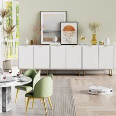 a living room scene with focus on the dining table and sideboard in the foreground