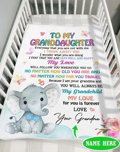 a baby's blanket with an elephant on it and the words to my granddaughter