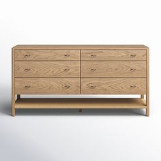 an image of a wooden dresser with drawers on the bottom and bottom drawer, against a white background