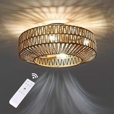 a wicker ceiling light with remote control in front of it and an image of a bamboo chandelier