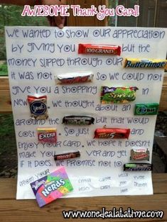 a sign with candy bars on it that says, we want to show our appreciation by giving