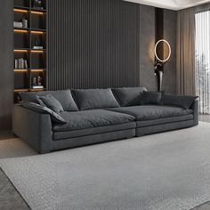 a living room with a large gray couch