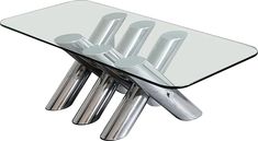 a glass table with metal legs and four knives on it's end pieces,