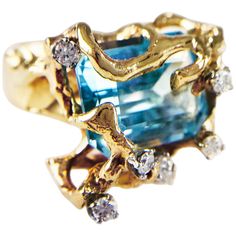 14k Gold Blue Topaz Free-Form Cocktail Ring, measuring 17.0 x 12.5mm. Seven round diamonds are thoughtfully placed in a free-form gold band that is the ultimate in uniqueness with a carat total weight of 0.42ctw. The ring size is 6 and the ring has a gold weight of 23.9 grams. Vintage Cocktail Ring, Vintage Cocktail, Gold Band, Cluster Ring, Cocktail Ring, Gold Yellow, Cocktail Rings, Estate Jewelry, Gold Bands