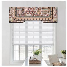 the window valance is decorated with colorful designs