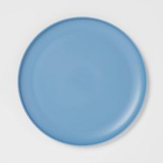 a blue plate sitting on top of a white table