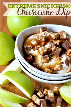 an apple and cheesecake dip in a bowl next to sliced apples