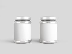 two white jars with silver lids sitting side by side on a gray background, one empty and the other closed