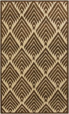 a brown and white rug with an abstract design