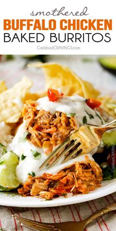 a white plate topped with shredded chicken and tortilla chips