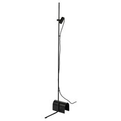 a black floor lamp on a white background