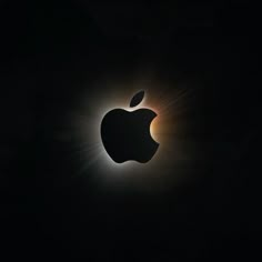 the eclipse in front of an apple logo