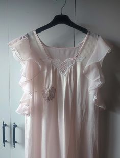 Vintage clothing, very light lavender pink nylon nightgown white lace neckline Dimensions were taken while they were straight. don't forget to double between the armpit to armpit about 22" doubled 44" waist 22" hips 23" length: 53- 54"" 135cm Material: polyester mix. no tag Condition: Used item. good conditon, There is wear on the right breast, sequin lace flower applique was sewn on it by me. The interior can be seen in the photos. There are slight thread pulls on the fabric. armholes are much Sleeveless Pink Nightgown For Sleep, Pink Sleeveless Nightgown For Sleep, Pink Sleeveless Nightgown For Bedtime, Feminine Sleeveless Sleepwear For Wedding Night, Delicate Sleeveless Sleepwear For Wedding Night, Feminine Sleeveless Wedding Nightgown, Vintage Pink Sleeveless Nightgown, Pink Sleeveless Vintage Nightgown, Feminine Ruffled Nightgown For Wedding