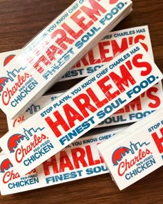 several stickers are stacked on top of each other to say harlem's first soul food