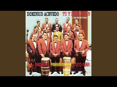 a group of men in red suits and bow ties posing for a photo with drums