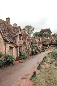 an old country road lined with stone houses