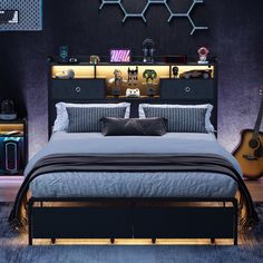 a bed room with a neatly made bed next to a night stand and guitar on the wall