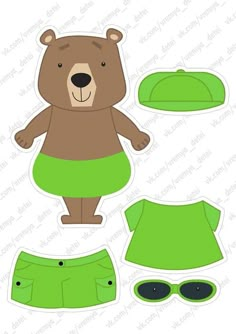 paper cut out of a teddy bear wearing green clothing