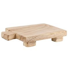 a wooden table with two legs and one foot on the end, in front of a white background